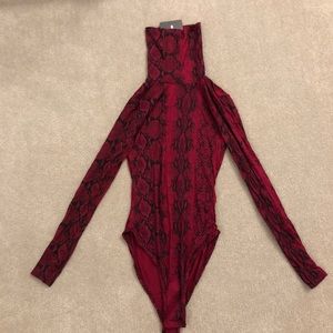Burgundy snack skin body suit (NEVER WORN)